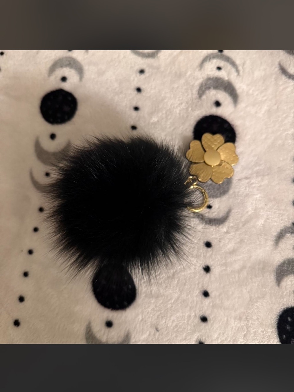 Michael Kors Black Faux Fur Pom Pom Keychain with Gold Flower Charm